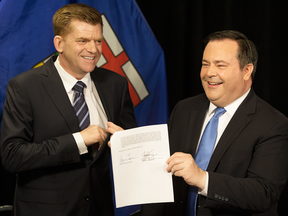 Wildrose Party leader Brian Jean and Alberta PC leader Jason Kenney announce a deal to merge the parties and create the United Conservative Party, Thursday May 18, 2017.