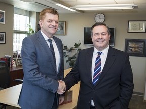 Wildrose Leader Brian Jean and PC Leader Jason Kenney on Monday, March 20, 2017
