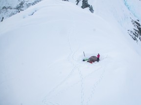 Argentinian climber Natalia Martinez photographed from the air on the east ridge of Mount Logan, Canada’s tallest peak. Only five days after this April 26 image was taken, a series of avalanches and ice collapses spurred by a magnitude 6.2 earthquake would strand Martinez in one of the mountain’s most treacherous sections.