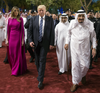 U.S. President Donald Trump accompanied by First Lady Melania Trump (left), and Saudi Arabia’s King Salman bin Abdulaziz al-Saud arriving for a reception ahead of a banquet at Murabba Palace in Riyadh on May 20, 2017. Melania did not wear a head covering to visit Saudi Arabia, a religiously conservative country.