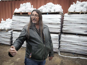 Kanesatake chief Serge Simon in front of sand bags waiting to be delivered to flooded residents of his community on Tuesday May 9, 2017.