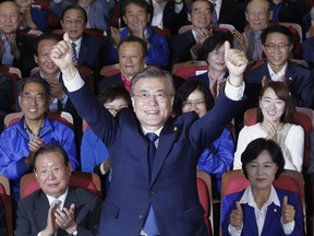 South Korea's presidential candidate Moon Jae-in of the Democratic Party as the results come showing he is leading in exit polls for the presidential election in Seoul, South Korea, Tuesday, May 9, 2017.