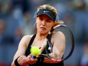 Eugenie Bouchard returns a shot against Angelique Kerber at the Madrid Open on May 10.