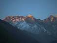 In this Feb. 18, 2016 file photo, Mount Everest, center, and Mount Lhotse, right, are seen from Tengboche, Nepal.