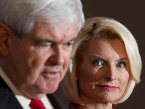 Former House Speaker Newt Gingrich delivers remarks as his wife Callista looks on, inside the Christ Central Community Center in Winnsboro, South Carolina on January 18, 2012.