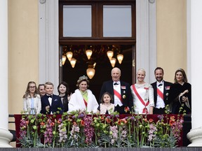 From left: Norway's Leah Isadora Behn, Princess Ingrid Alexandra, Prince Sverre Magnus, Maud Angelica Behn, Queen Sonja, Emma Tallulah Behn, King Harald, Crown Princess Mette-Marit, Crown Prince Haakon and Princess Martha greets the audience from the Royal Palace, as the King and Queen both celebrate their 80th birthdays, in Oslo, May 9, 2017.