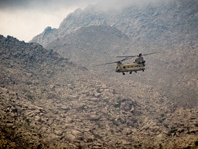 A U.S. Army CH-47 Chinook helicopter flies near Jalalabad, Afghanistan, on April 5, 2017.