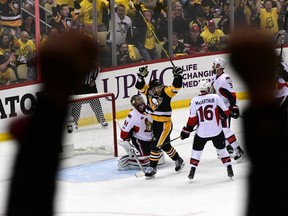 Pittsburgh Penguins players celebrate a Bryan Rust goal against the Ottawa Senators on May 21.