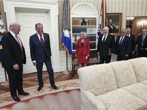 A handout photo made available by the Russian Foreign Ministry on May 10, 2017 shows US President Donald J. Trump (left) and Russian Foreign Minister Sergei Lavrov (second-left) during a meeting at the White House.