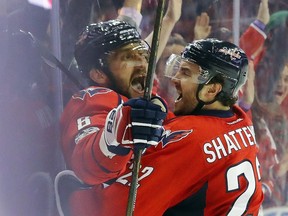Alex Ovechkin (left) celebrates his goal against the Pittsburgh Penguins with teammate Kevin Shattenkirk on May 6.