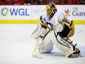 Pittsburgh Penguins goalie Marc-Andre Fleury tracks the puck against the Washington Capitals on May 10.
