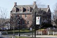 This Feb. 26, 2016 file photo shows the entrance to St. Paul's School in Concord, N.H. The school released a report on Monday, May 22, 2017, detailing sexual misconduct allegations against a dozen men and one woman who worked at the school between 1952 and 1999. An investigation found substantiated claims of abuse involving 13 former faculty and staff including former teachers, chaplains and an admissions officer.