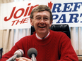 Preston Manning in front of a "Join the Reform Party" sign in November 1988.