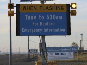 An emergency sign flashes by the Hanford Nuclear Reservation Tuesday, May 9, 2017, in Richland, Wash.
