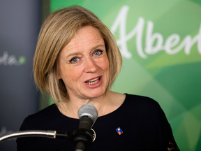 Alberta Premier Rachel Notley plans to raise the province's minimum wage to $15 by next year.