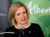 Alberta Premier Rachel Notley plans to raise the province’s minimum wage to $15 by next year.