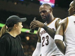 Cleveland Cavaliers forward LeBron James ends up with a beer bottle in his hand against the Toronto Raptors on May 1.