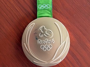 This photo provided by Kevin Snyder show Kyle Snyder's damaged gold metal from the 2016 Rio Olympics on Tuesday, May 23, 2017, in Maryland.
