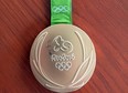 This photo provided by Kevin Snyder show Kyle Snyder's damaged gold metal from the 2016 Rio Olympics on Tuesday, May 23, 2017, in Maryland.
