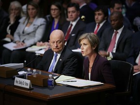Former acting U.S. Attorney General Sally Yates, right, and Former Director of National Intelligence James Clapper, left, testify before the Senate Judicary Committee's Subcommittee on Crime and Terrorism in the Hart Senate Office Building on Capitol Hill on May 8, 2017 in Washington, DC.