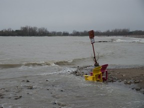 City workers were sandbagging, installing armour rock and moving earth
 Friday to protect the Toronto Islands from rising lake levels.