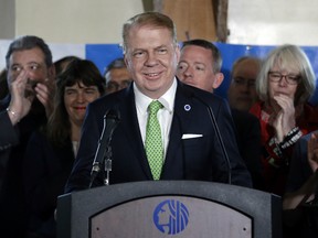 Seattle Mayor Ed Murray briefly smiles before saying that he is dropping his re-election bid for a second term on Tuesday, May 9, 2017 in Seattle.