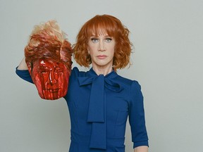 Griffin poses with a fake severed head of U.S. President Donald Trump.