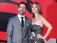 Zack Snyder (L) and his wife US film producer Deborah Snyder.