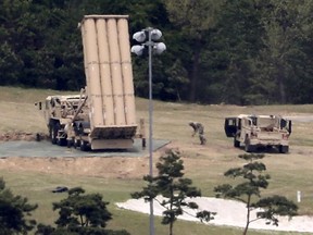 In this May 2, 2017, file photo, a U.S. missile defence system called Terminal High Altitude Area Defense, or THAAD, is installed on a golf course in Seongju, South Korea.