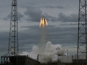 SpaceX's Dragon capsule launches on May 6, 2015, from Cape Canaveral, Fla. SpaceX fired the mock-up capsule to test the super-streamlined launch escape system for astronauts.