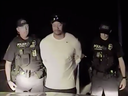 In this screengrab from a video released by police in Florida, Tiger Woods is arrested for DUI on May 29, 2017.
