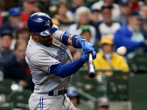 Toronto Blue Jays 2B  Devon Travis homers against the Milwaukee Brewers on May 24.