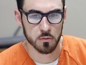 In this Sept. 7, 2016 file photo, Josh Vallum is photographed in the George County Regional Correctional Facility in Lucedale, Miss.