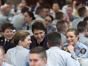 Prime Minister Justin Trudeau visits with cadets at RCMP Depot in Regina, Saskatchewan on Jan. 26, 2017.