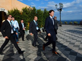 Prime Minister Justin Trudeau leaves his closing press conference following the G7 Summit in Taormina, Italy on Saturday, May 27, 2017.