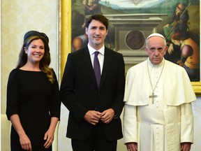 Prime Minister Justin Trudeau and wife Sophie Gregoire Trudeau meet with Pope Francis for a private audience at the Vatican on Monday, May 29, 2017.