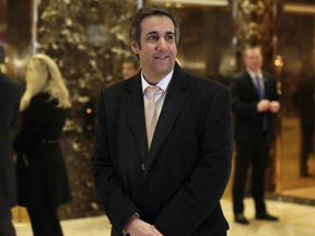 Michael Cohen arrives in Trump Tower in New York. A House intelligence committee staffer says the panel recently issued a subpoena to President Donald Trump's personal attorney, Michael Cohen, as part of its ongoing investigation into Russia's election meddling.