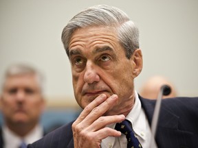 In this June 13, 2012, file photo, then-FBI director Robert Mueller  testifies on Capitol Hill in Washington.