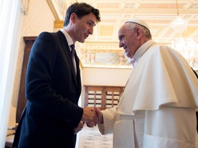 Canadian Prime Minister Justin Trudeau shakes hands with Pope Francis on the occasion of their private audience, at the Vatican, Monday, May 29, 2017.