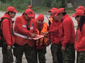 Members of the Canadian Rangers set out for their nightly patrols in the Wapekeka First Nation, which declared a state of emergency following a series of youth suicides.