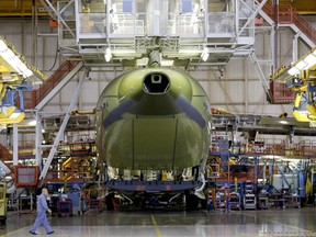 A Boeing C-17 Globemaster III is being assembled at the Boeing assembly facility in Long Beach, Calif. in a July 31, 2012. The Canadian government may grant Boeing a massive contract to maintain the air force's fleet of C-17s despite a trade dispute with Bombardier.