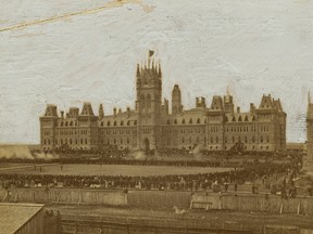 The scene captured by early Ottawa photographer Elihu Spencer on July 1, 1867, birthday of the Dominion of Canada, showing the firing of the noon-hour "feu de joie" ó a "fire of joy" gun salute ó by a rifle regiment on the grounds in front of the original Parliament Buildings.