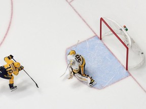 Nashville Predators forward Viktor Arvidsson (left) scores on Pittsburgh Penguins goalie Matt Murray on June 5.