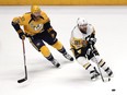 Pittsburgh Penguins forward Phil Kessel (right) skates away from Nashville Predators defenceman Mattias Ekholm on June 5.