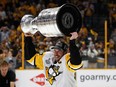 Pittsburgh Penguins captain Sidney Crosby skates with the Stanley Cup on June 11.