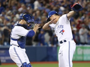 Roberto Osuna - Russell Martin - Toronto Blue Jays