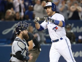 Russell Martin of the Blue Jays celebrates after hitting a solo home run in the eighth inning against the Tampa Bay Rays at Rogers Centre in Toronto on Wednesday night.