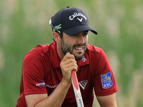 Adam Hadwin lines up a putt in the second round of the U.S. Open on June 16.