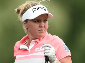 Brooke Henderson of Canada watches her tee shot on the sixth hole during the second round of the Meijer LPGA Classic at Blythefield Country Club in Grand Rapids, Mich., on Friday.