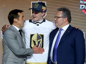 Cody Glass poses for photos after being selected sixth overall by the Vegas Golden Knights during the 2017 NHL Draft at the United Center on Friday in Chicago.